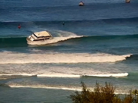 Boat and wave