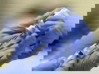DOJ To Expunge Employees' COVID-19 Vaccination Records: Lawyers