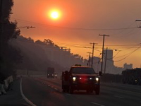 Fire officials deploy more tankers to battle western wildfires
