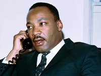 Martin Luther King Jr. speaking on the telephone
