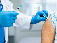 Older woman getting vaccine