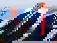 Putin and Trump shake hands